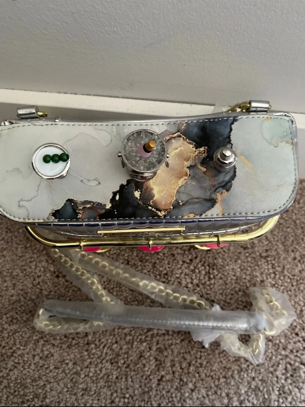 Betsey Johnson Silver Cocktail Bar Crossbody with Pink Seat Accents